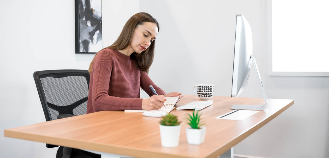 Photo of a young woman in a workplace   