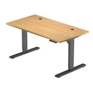 ash table top with two grommets on black solo ryzer standing desk